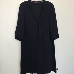 Navy blue work dress with pussy tie bow